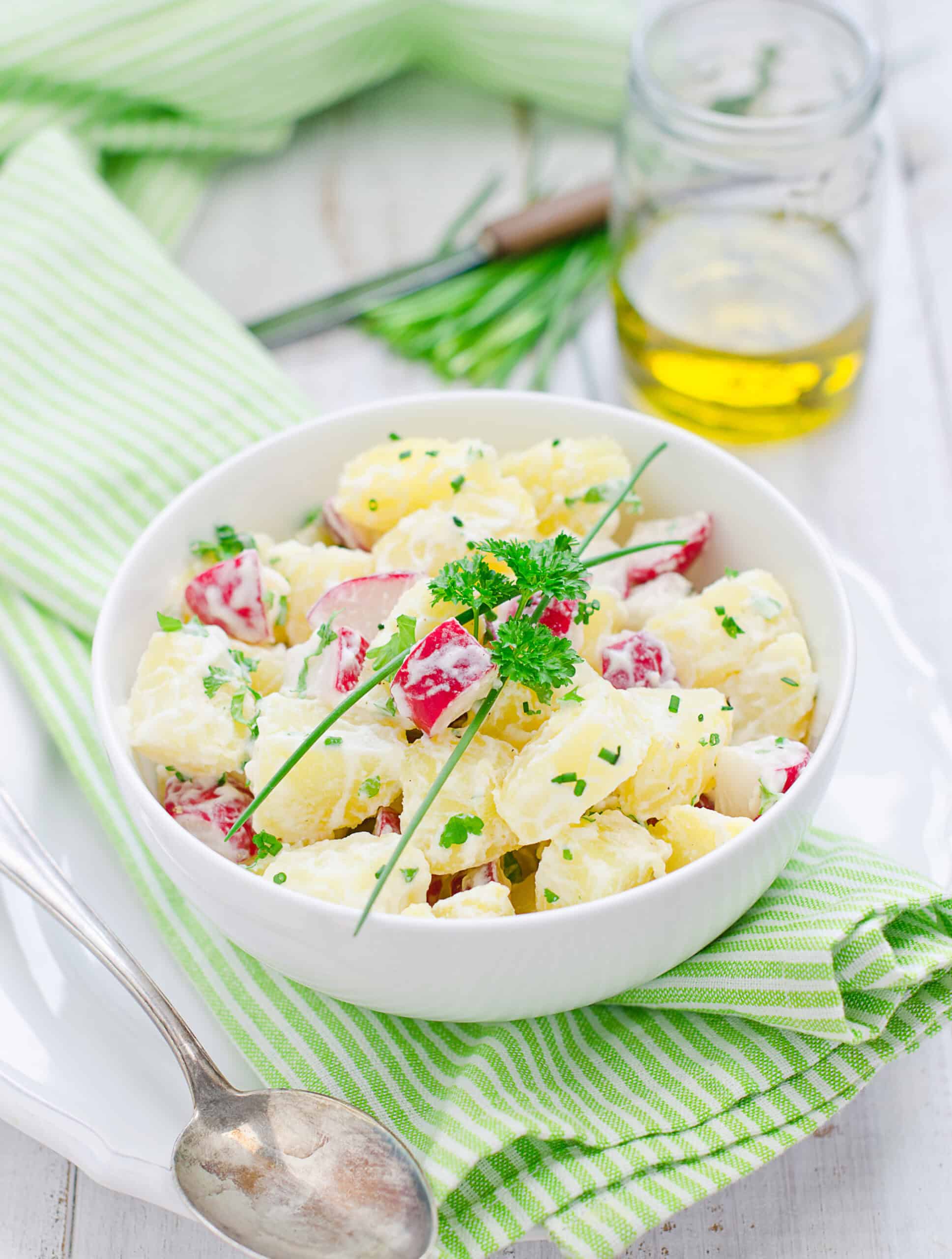Delicious homemade potato salad with fresh ingredients and creamy dressing. Perfect for gatherings a.